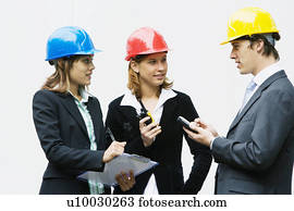 Team of young professionals on a construction site