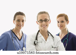 Portrait of smiling Caucasian women medical healthcare workers in uniforms against white background.