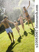 Family at home playing in garden