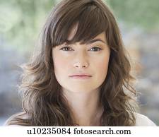 Portrait of a woman with long dark hair