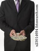 Man holding American money