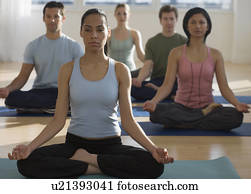 Group of people practicing yoga