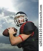 Low angle view of football player