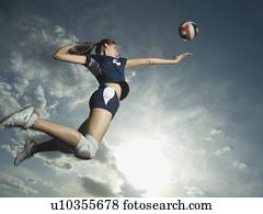 השקפה של זוית נמוכה, של, שחקן של כדור העף, לקפוץ