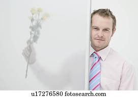 Business man with flowers