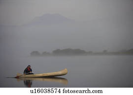 Kayaking in the morning mist.