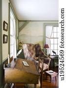 Old fashion lift top desk in colonial living room