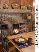 Place setting in colonial style dining room