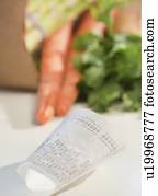 Compass on pile of money