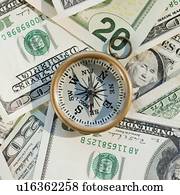 Dice on pile of money