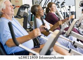 Patients Working Out In Gym