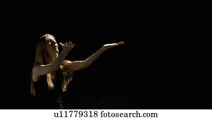 Woman holding arms out 