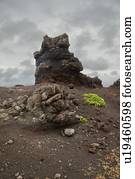 Clouds over volcanic rock formation  