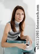 Woman drinking coffee. Woman drinking coffee.