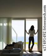 Woman looking out towards the sea