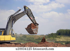Excavator working on a contaminated land remediation.