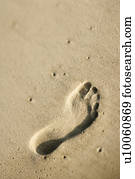 Footprint in sand.