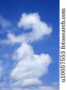 Cloud formation in blue sky.