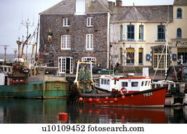 Fishing boats in Padstow harbour Southeast England
